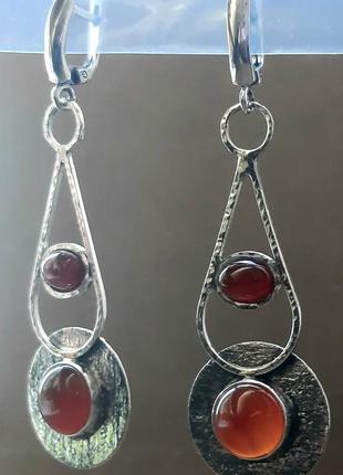 Дизайнерские эксклюзивные серебряные серьги 925 с натуральным сердечником1 фото