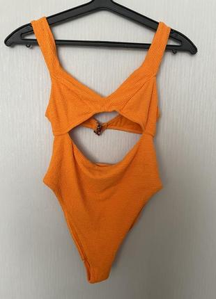 Очень крутой яркий оранжевый сексуальный купальник/монокини.3 фото