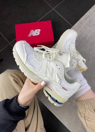 Белые кроссовки new balance 2002r2 фото