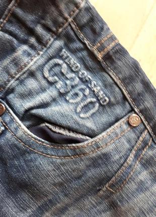 Фирменные джинсы с потертостями9 фото