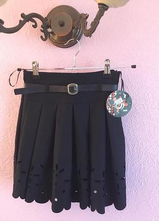 Шкільна спідниця для дівчинки на ріст 128