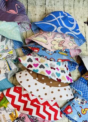 Яскраві двосторонні панамки на ог 48-58 см