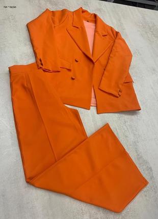 Оранжевый костюм на подкладке2 фото