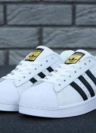 Крутые кожаные кроссовки adidas superstar.