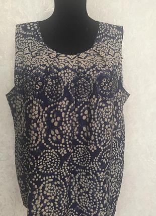 Дуже красива майка,спереду розшита поетками ,ліф і зад на подкладной