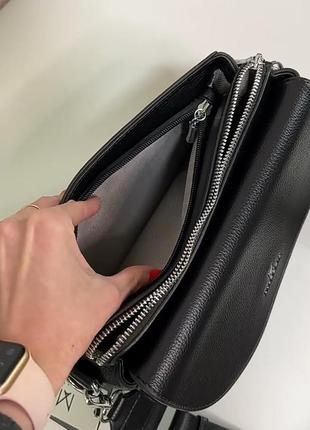Черная, удобная сумочка+длинный регулируемый текстильный ремешок.6 фото