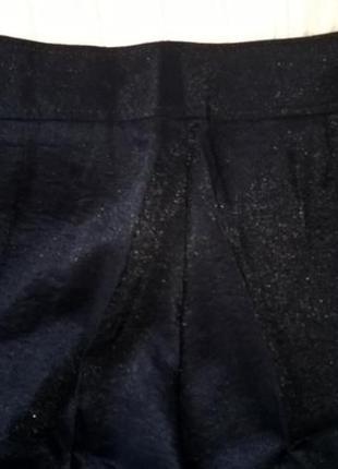 Чёрные брюки с блеском свободного кроя4 фото