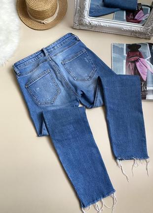 Жіночі джинси з рваностями6 фото