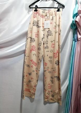 Спортивные штаны палаццо трубы с надписями разные расцветки2 фото