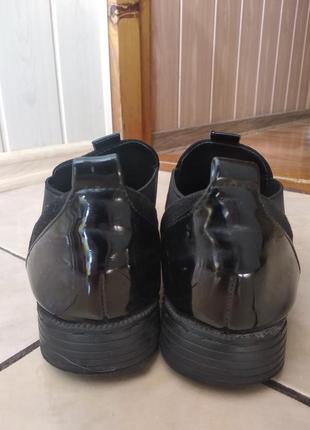 Чорні туфлі.2 фото
