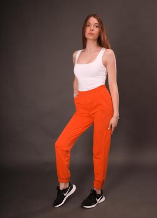 Штаны джоггеры женские морковного цвета из двунитки на резинке 42, 44, 46, 483 фото
