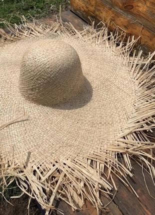 Широкополий солом'яний капелюх посатаний з бахромою1 фото