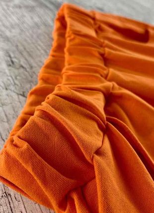 Классические шорты оранжевого цвета4 фото