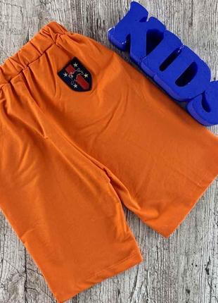Классические шорты оранжевого цвета2 фото