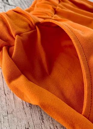 Классические шорты оранжевого цвета3 фото