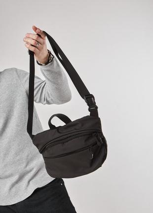 Поясная сумка, бананка через плечо стильный и практичный аксессуар черный цвет4 фото