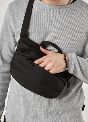 Поясная сумка, бананка через плечо стильный и практичный аксессуар черный цвет5 фото