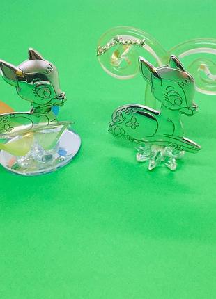 Серебряный лев с телефоном и ноутбуком9 фото