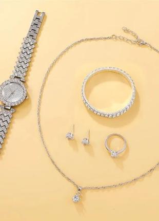 Годинник,браслет,підвіска,сережки2 фото