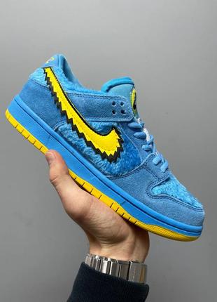 Нереальні кросівки nike sb dunk low x greatful dead blue bear блакитні з жовтим1 фото