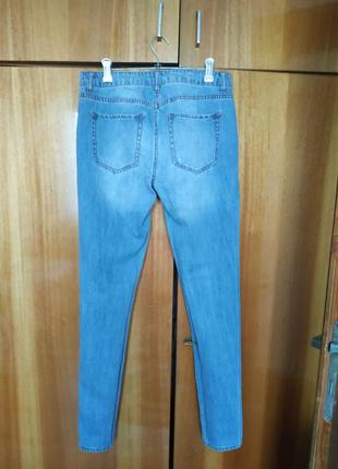 Распродажа шкафа женские джинсы 28 р.2 фото