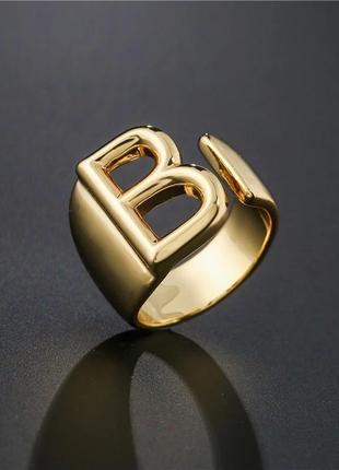 Кільце кольцо перстень колечко каблучка буква в золотисте нове стильне