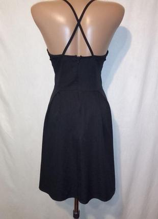 Стильне чорне плаття зі складками на юбці2 фото