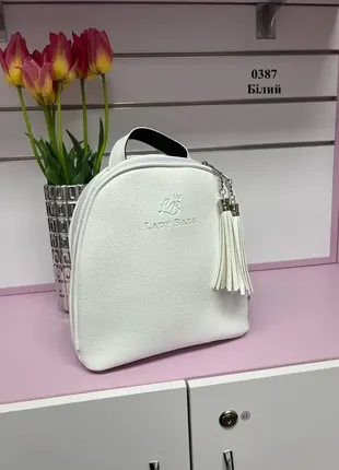 Белая - стильная сумка-рюкзак lady bags на два отделения на молнии, со съемными кисточками2 фото