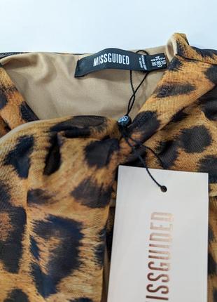 Сукня у леопардовий принт від missguided.
рукав сіточка, основна частина сукні на бежевій підкладочці.6 фото