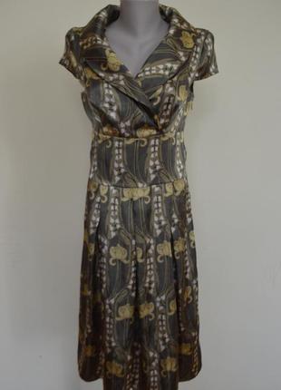 Красивое фирменное платье шикарного фасона1 фото