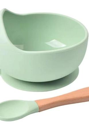 Набор силиконовой посуды для кормления ребёнка из двух предметов на присоске1 фото