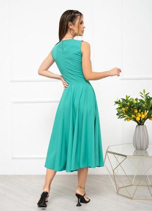 Зеленое классическое платье без рукавов2 фото