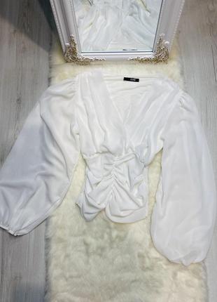 Розкішна біла блуза з пишним рукавом7 фото