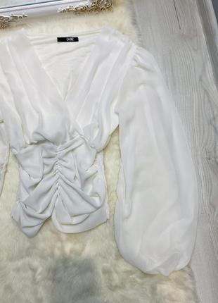 Розкішна біла блуза з пишним рукавом4 фото