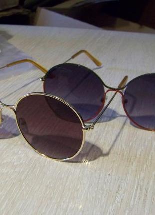 Крупные круглые солнцезащитные очки с золотой оправой и линзой винный градиент4 фото