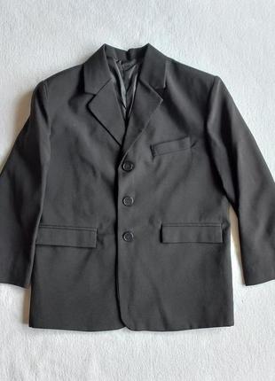Піджак легкий чорний, довжина 56 см.1 фото