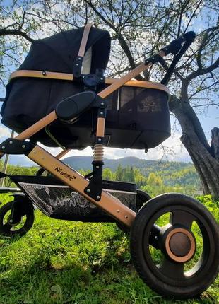Універсальна дитяча коляска трансформер 2в1 ninos freelander black.