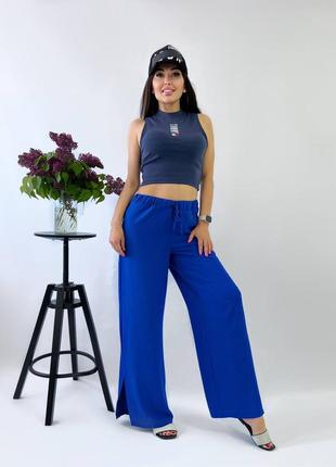 Жіночі брюки з розрізом, 42-52 розміри5 фото