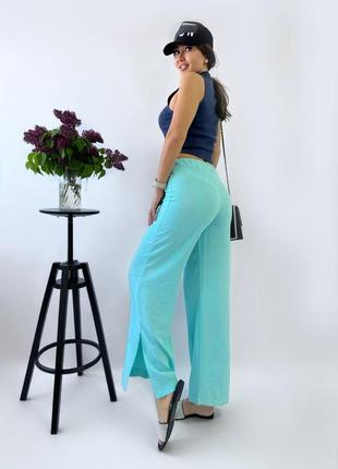 Жіночі брюки з розрізом, 42-52 розміри9 фото