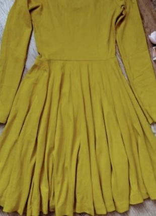 Приталенное платье с расклешенным низом круглым вырезом и длинными рукавами7 фото