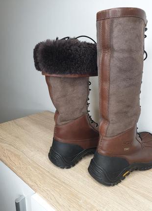 Шикарные натуральные кожаные замшевые высокие сапоги с мехом зимние ugg оригинал подошва vibram5 фото