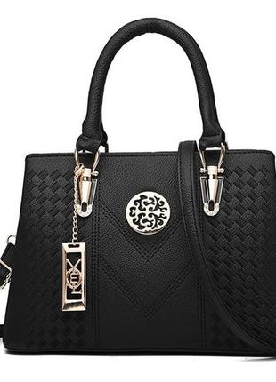 Сучасна жіноча чорна сумка через плече з екошкіри, модна трендова жіноча сумочка для дівчини.3 фото
