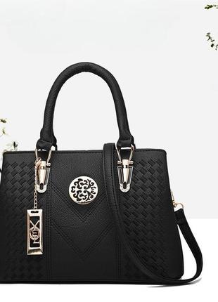 Сучасна жіноча чорна сумка через плече з екошкіри, модна трендова жіноча сумочка для дівчини.1 фото