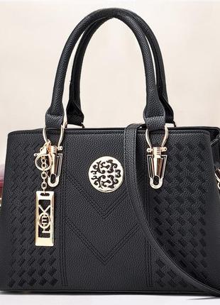 Сучасна жіноча чорна сумка через плече з екошкіри, модна трендова жіноча сумочка для дівчини.2 фото