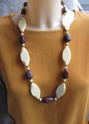 Етнобуси з пластин слонової кістки та старовинної яшми