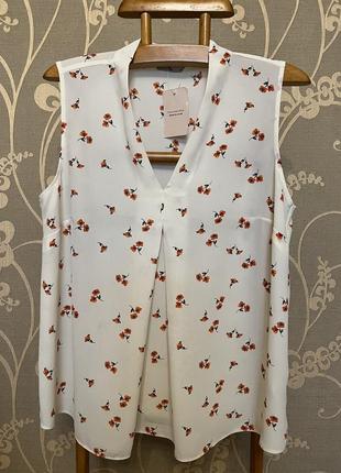 Очень красивая и стильная брендовая блузка в цветочках 22.2 фото