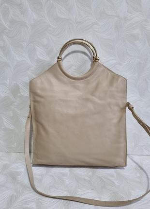 Интересная кожаная сумка дорогого бренда claudie pierlot,2 фото