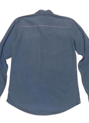 Джинсовая рубашка с длинными рукавами.2 фото