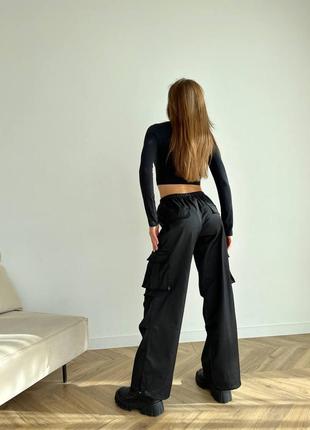 Штани карго з накладними кишенями кулісками затяжками стильні трендові широкі вільні оверсайз брюки спортивні чорні бежеві коричневі