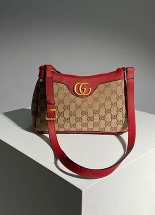 Жіноча брендова сумка